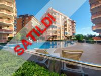 Alanya Mahmutlar'da muhteşem deniz manzaralı satılık eşyalı 2+1 daire.