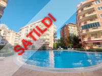Alanya Mahmutlar'da muhteşem deniz manzaralı satılık eşyalı 2+1 daire.