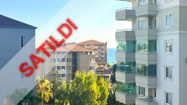 LÜKS BİR KOMPLEKSTE TÜM OLANAKLARA SAHİP MOBİLYALI VE BEYAZ EŞYALI 2+1 DAİRE SATILIKTIR.