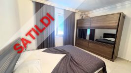 LÜKS BİR KOMPLEKSTE TÜM OLANAKLARA SAHİP MOBİLYALI VE BEYAZ EŞYALI 2+1 DAİRE SATILIKTIR.